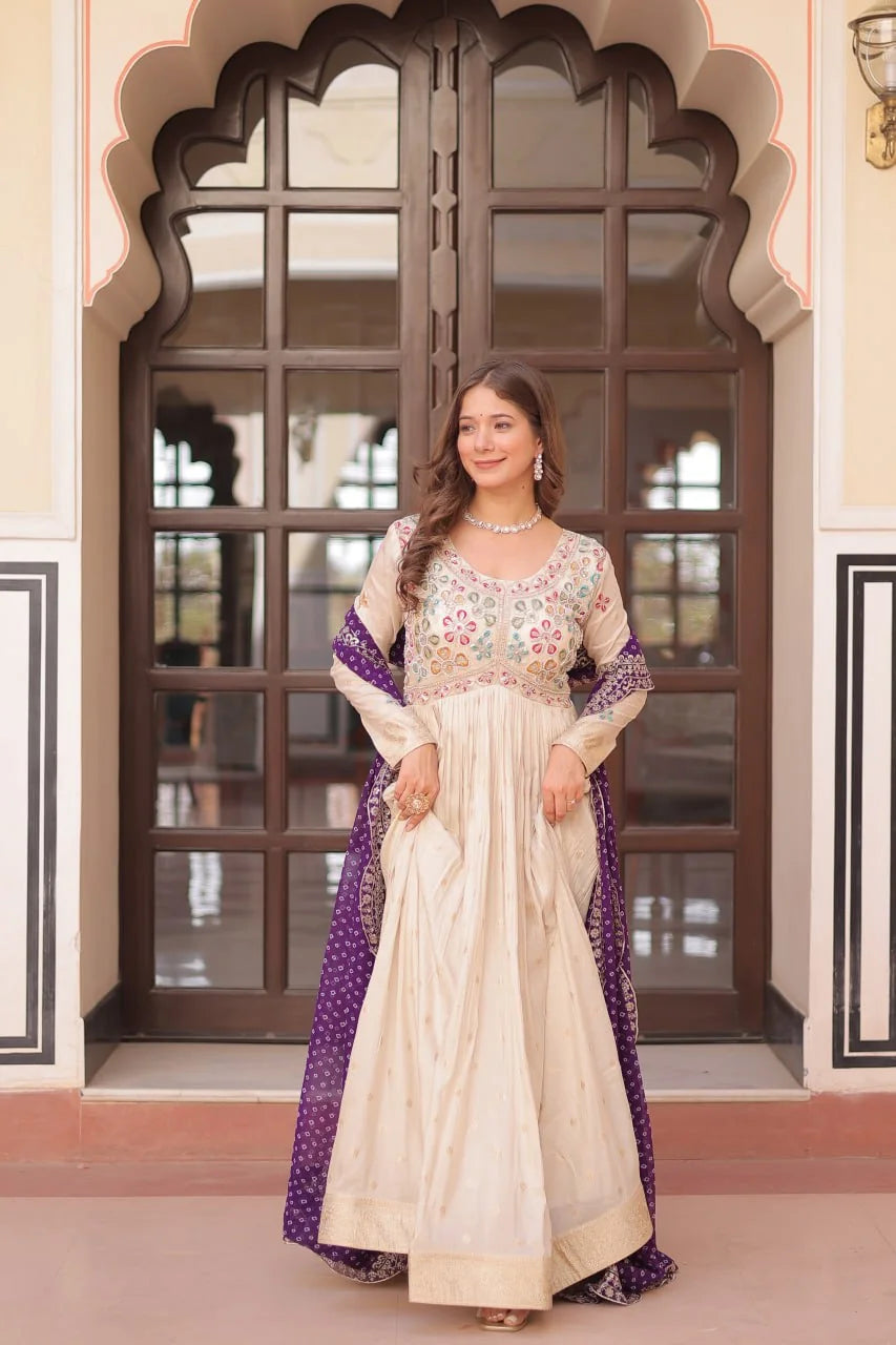 ivory gown embroidered yoke closeup with purple dupatta