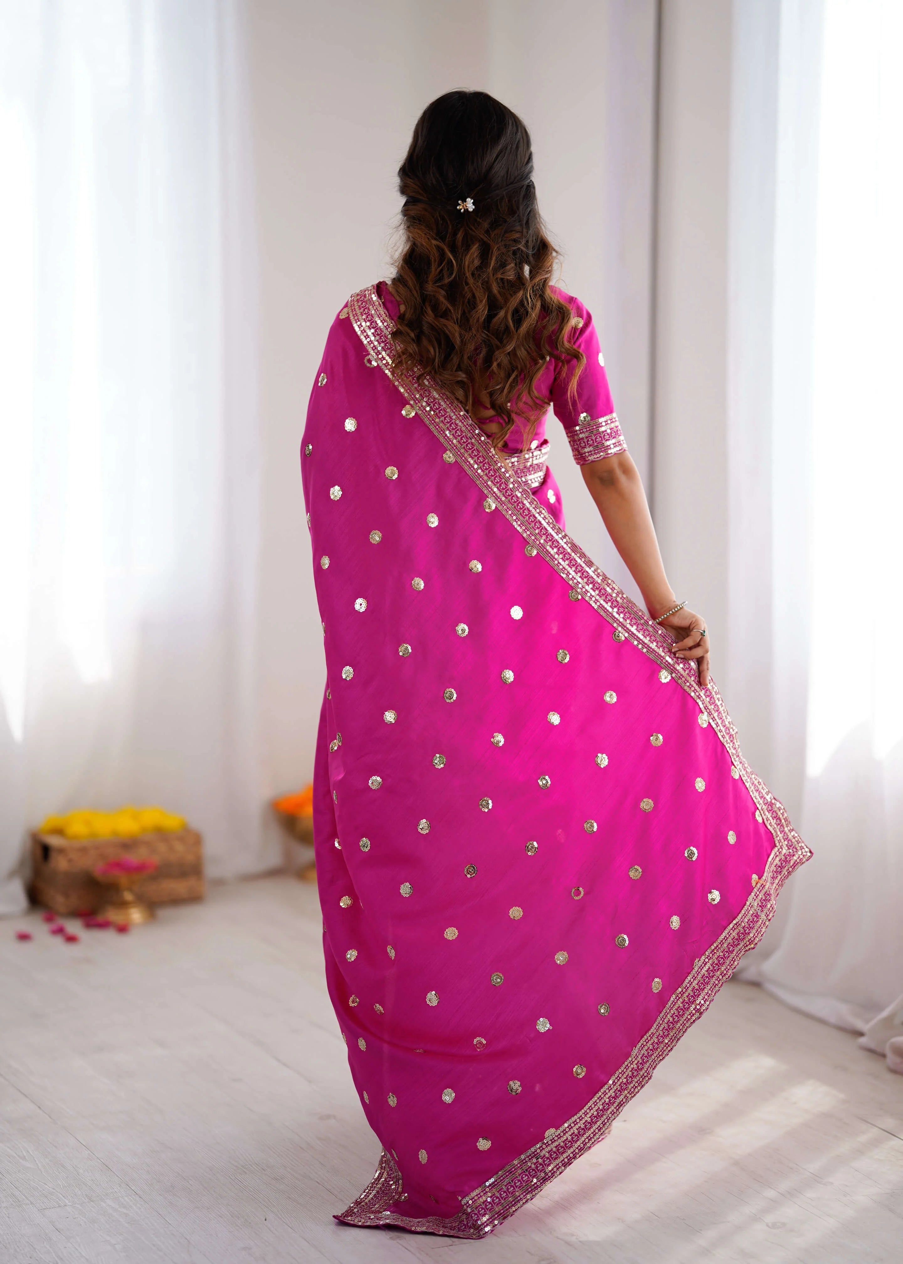 Rani pink georgette saree with sequin work back view showing pallu