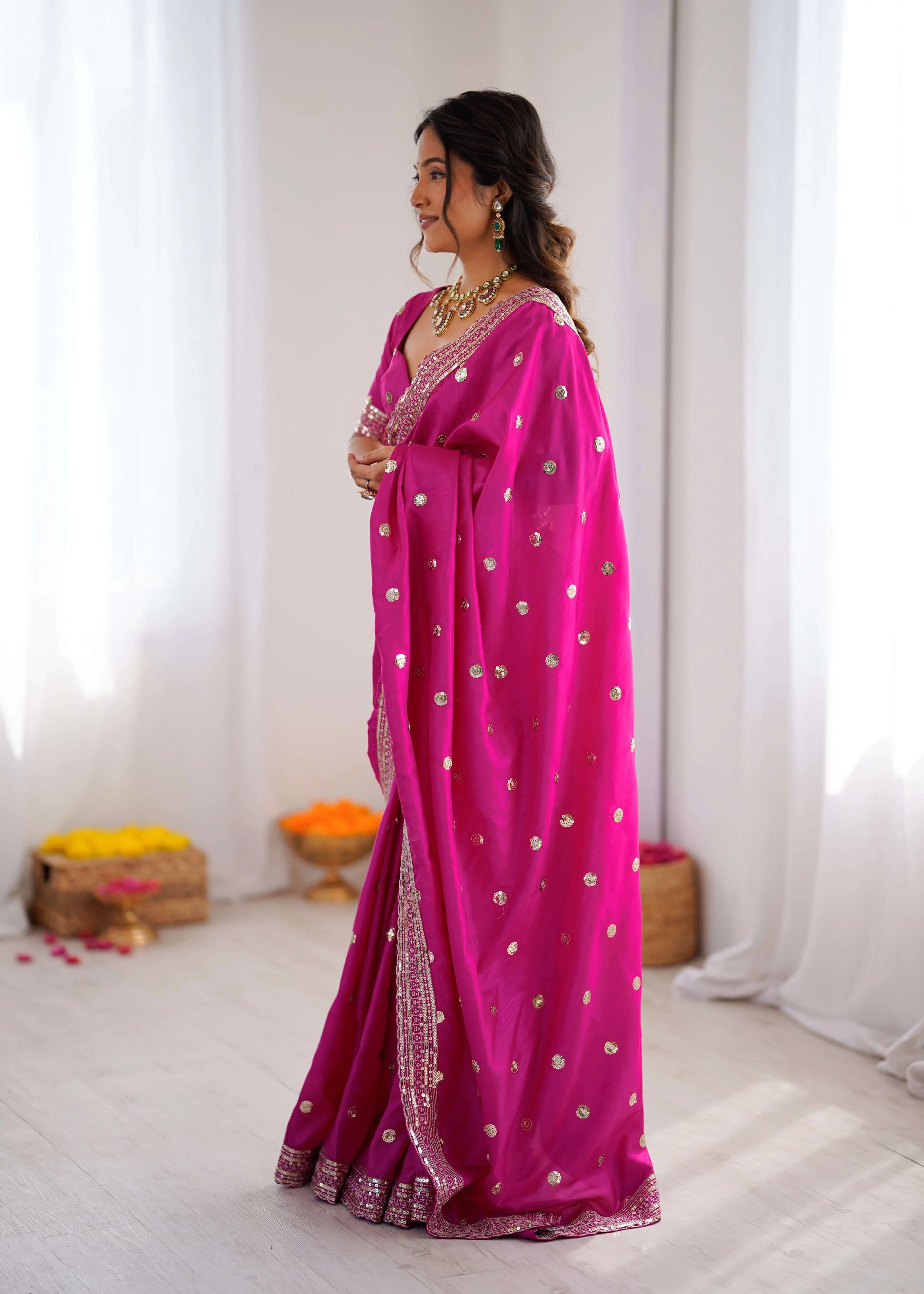 Heavy georgette saree with sequin work in rani pink full body drape