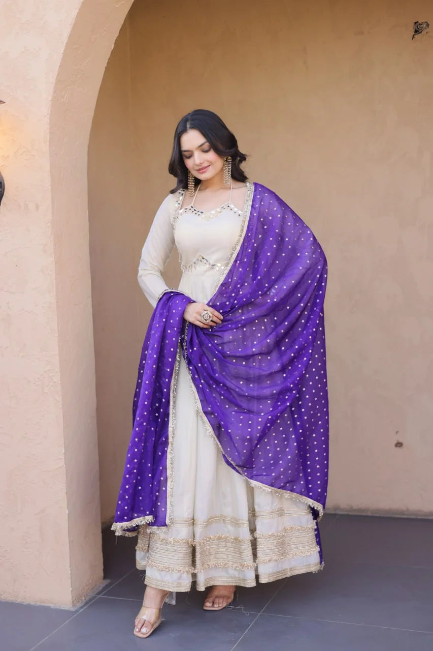 Ivory anarkali gown with purple moss dupatta standing full length festive