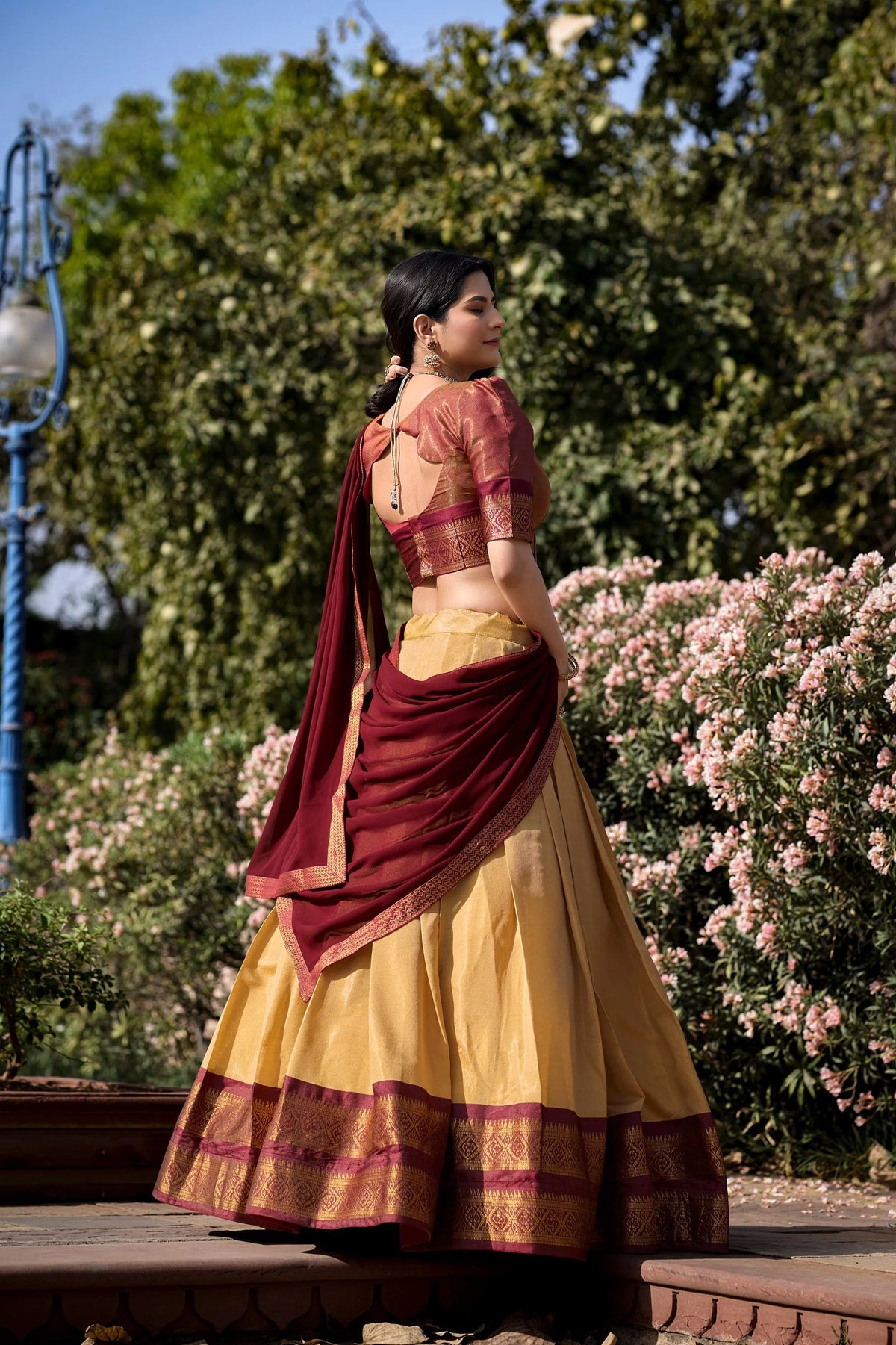 Teal and royal blue Kanchipuram half saree lehenga set full length outdoor