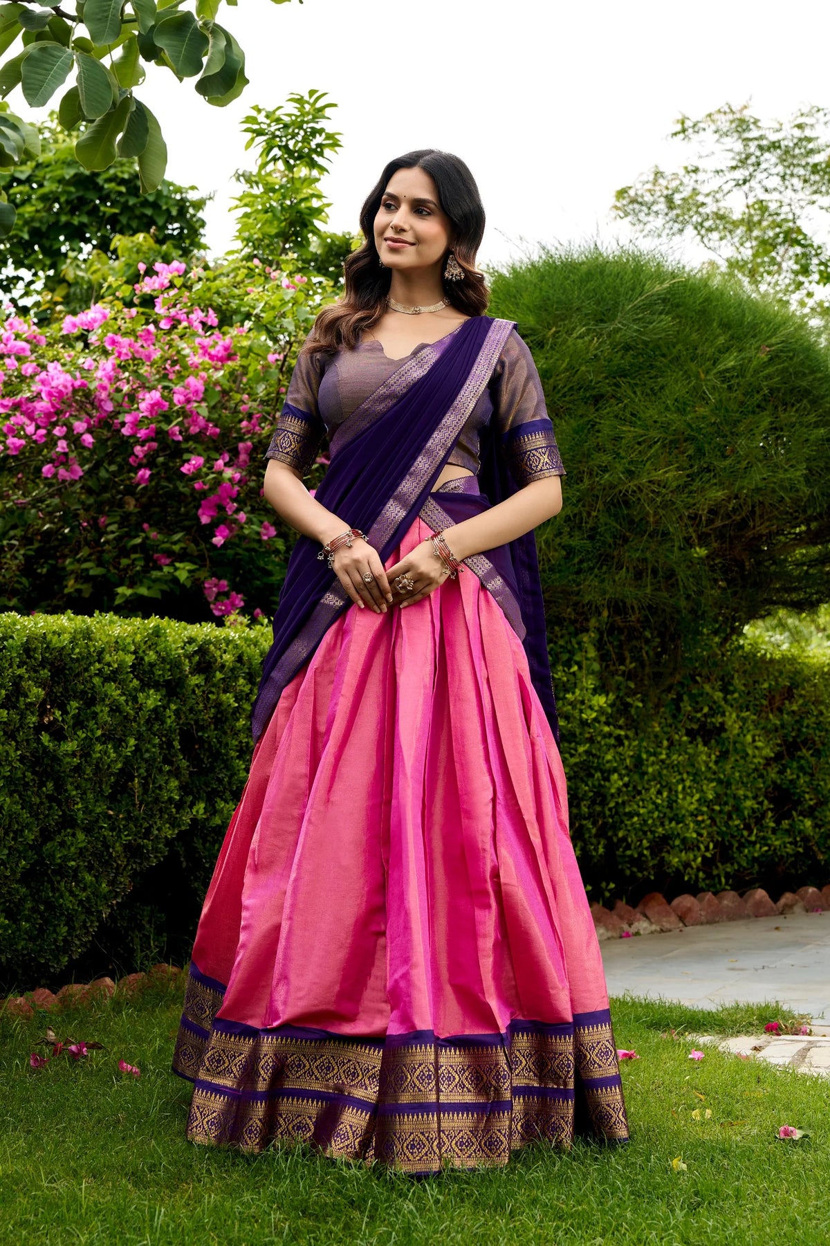 Mint green Kanchipuram lehenga set with navy zari temple border – front closeup