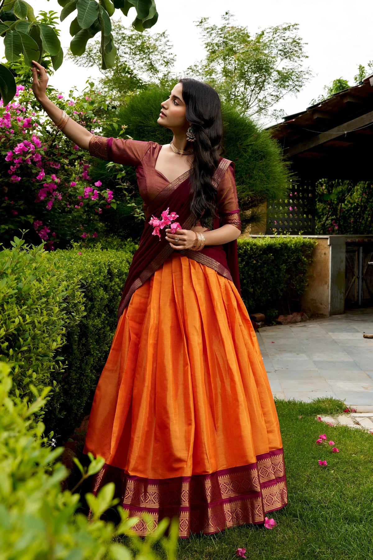 Mint green and navy Kanchipuram lehenga set twirling showing 3.80m flare