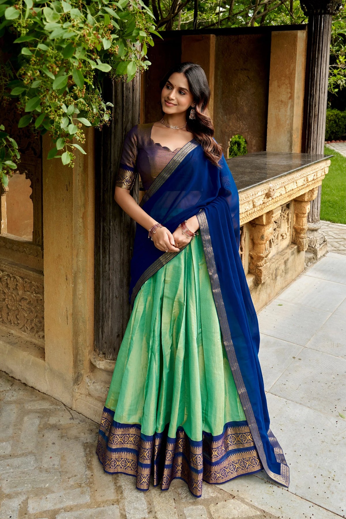Pink and purple Kanchipuram lehenga set front view with scallop blouse