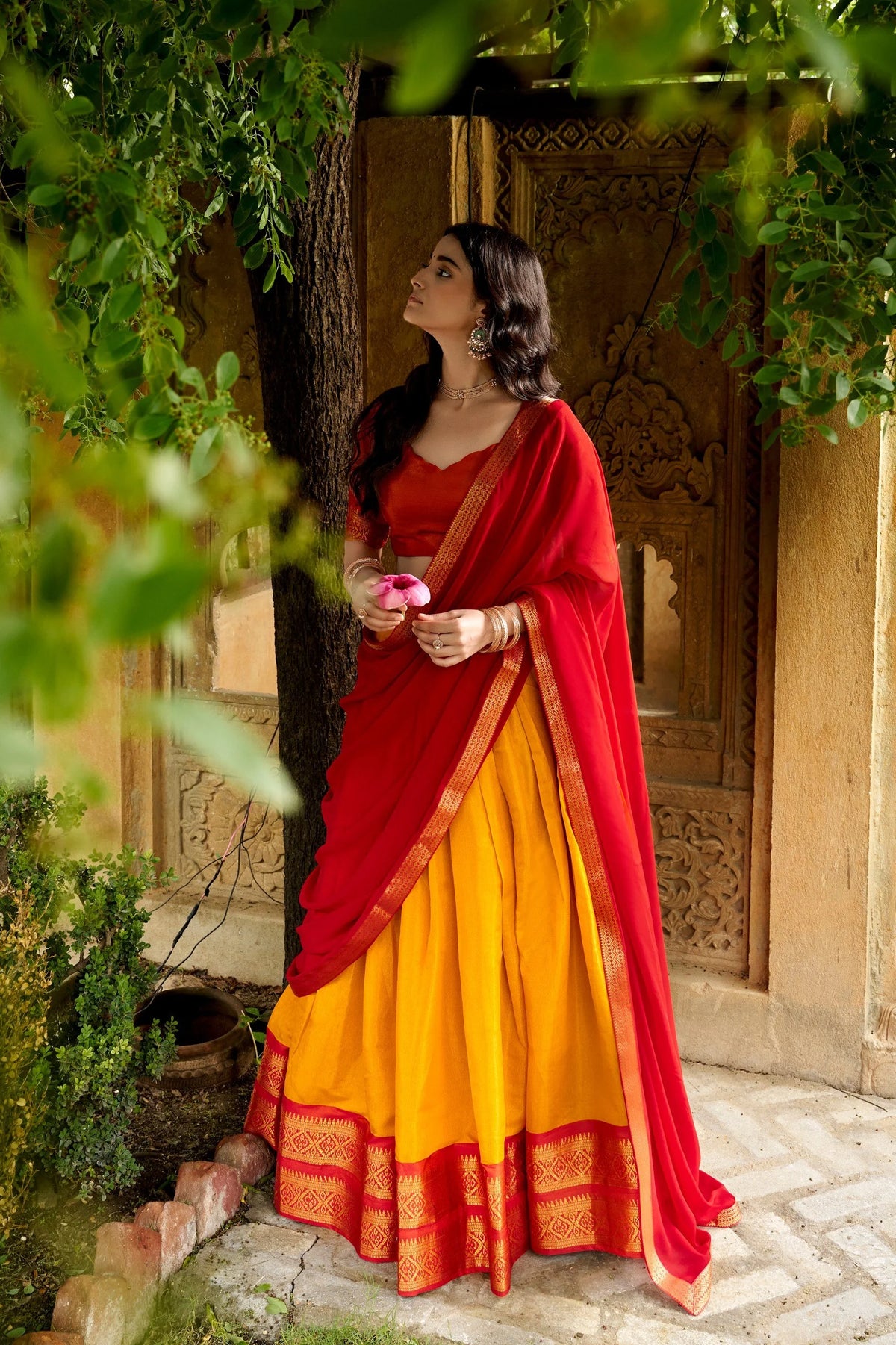 Pink and purple Kanchipuram lehenga set outdoor garden festive look