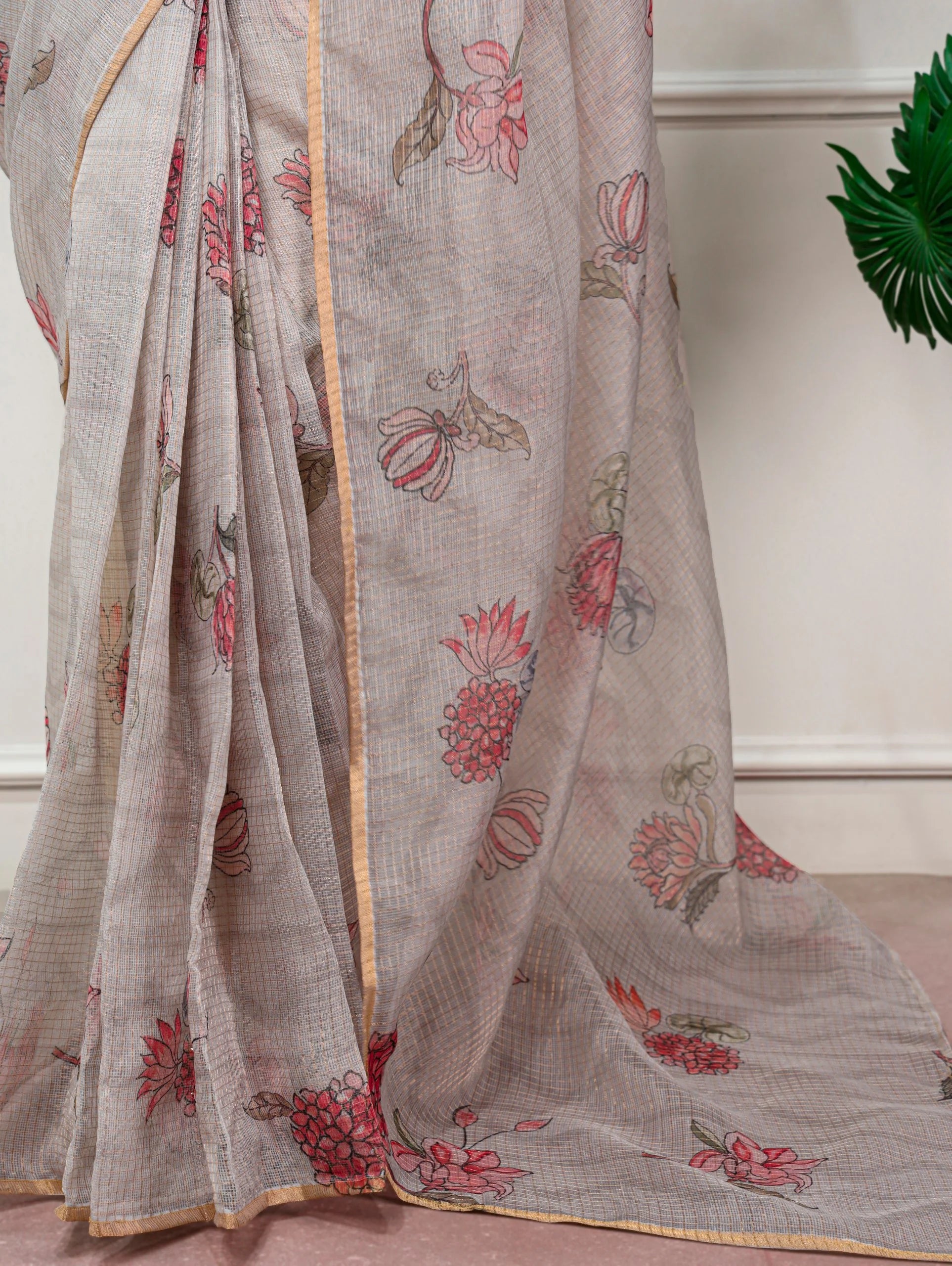grey kota doria saree fabric detail floral print closeup