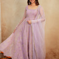 Full-length lavender organza anarkali set with net dupatta and lace border – front view
