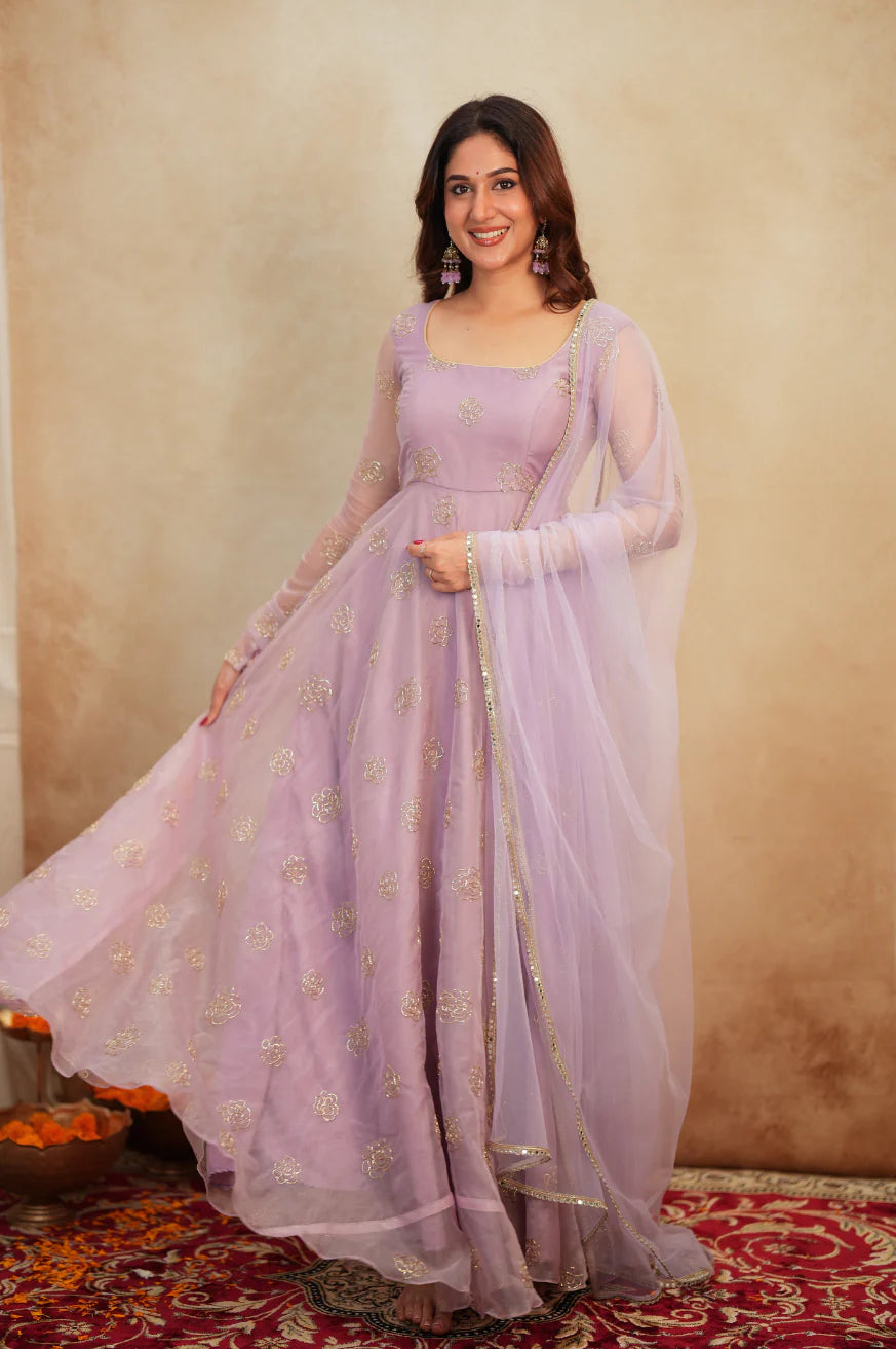 Full-length lavender organza anarkali set with net dupatta and lace border – front view