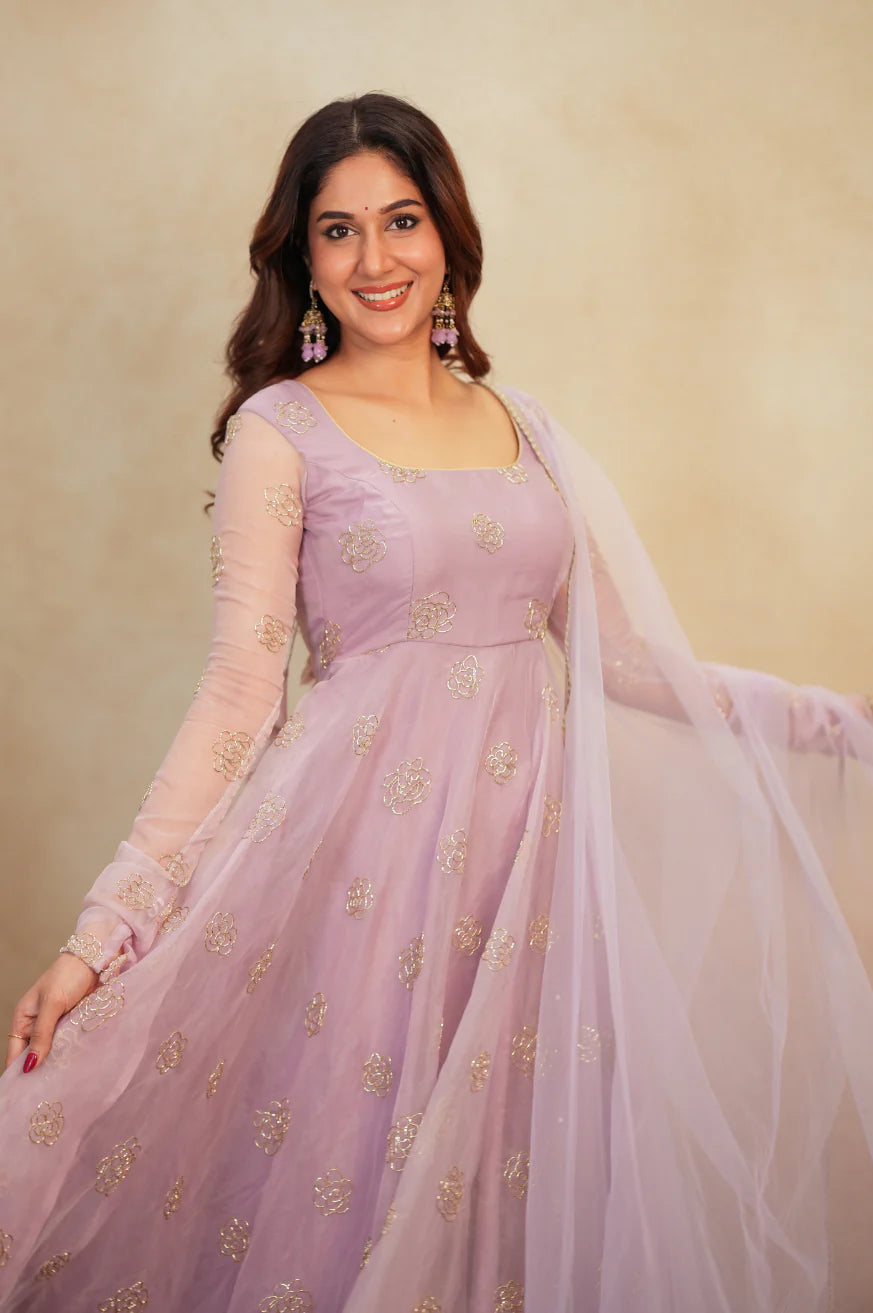Lavender organza anarkali with all-over gold rose embroidery and sheer full sleeves – model view