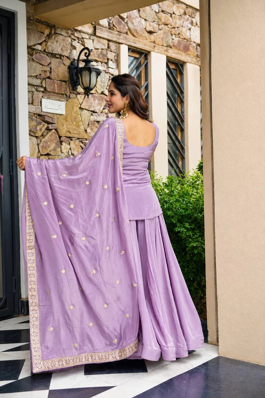 Lavender sharara set back view showing full dupatta with gold zari border