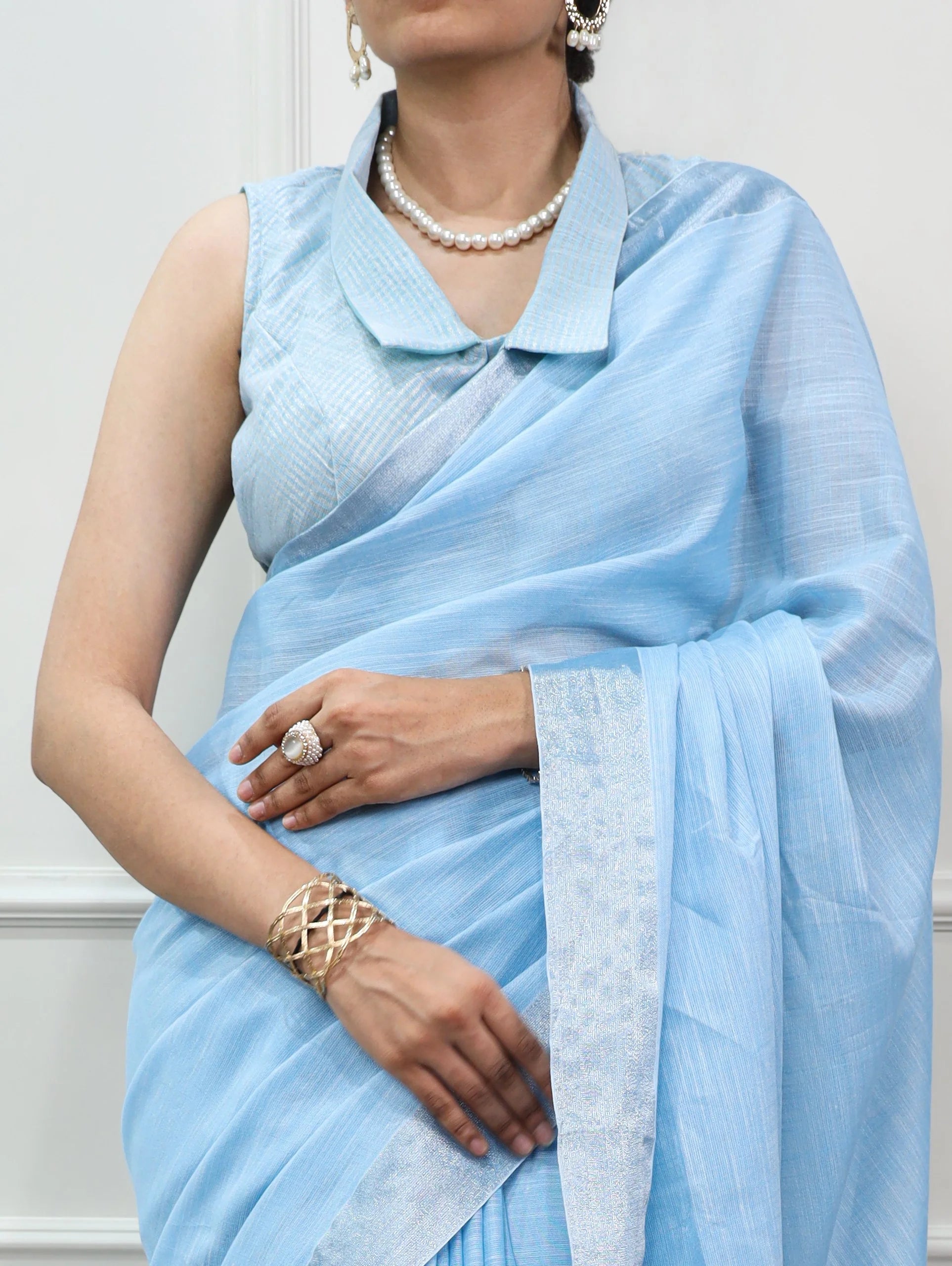 linen saree zari border sky blue close-up collar blouse