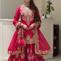 Model wearing magenta chinon silk sharara set with gold thread sequin work