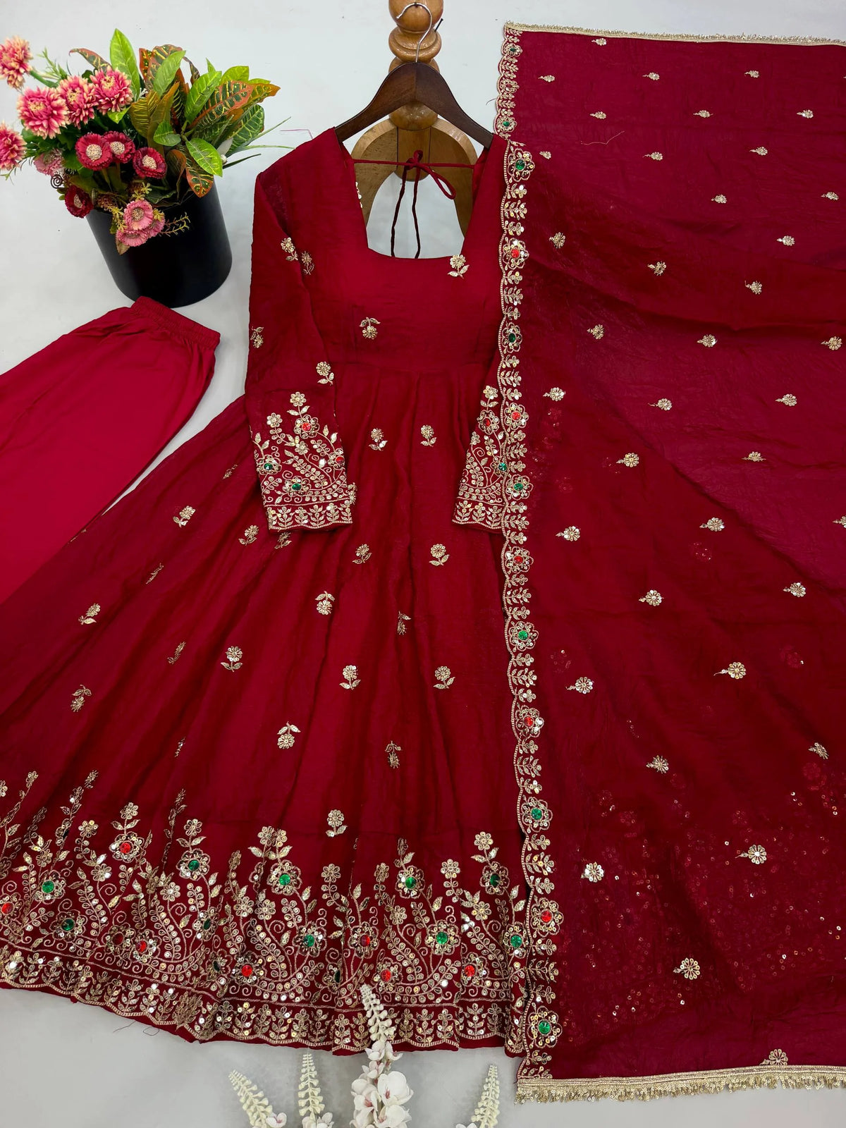 Maroon anarkali gown for women flat lay showing pant dupatta and diamond stone border