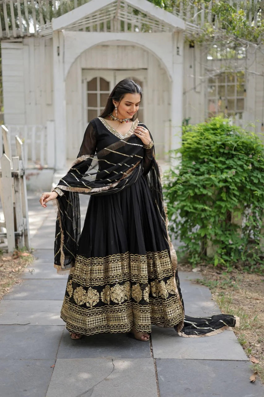 maroon gown with dupatta seated embroidery closeup