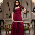 Maroon palazzo set for women with real mirror work — full front view heritage palace setting