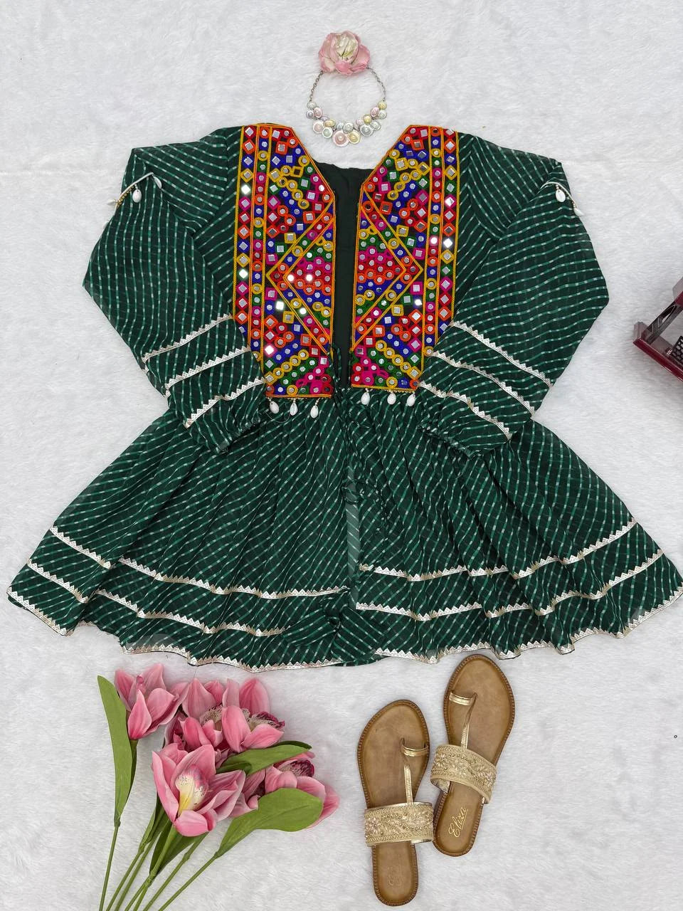 mirror work peplum top green flat lay festive