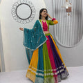 Multicolor bandhani lehenga choli side view – rani pink olive green yellow purple panels