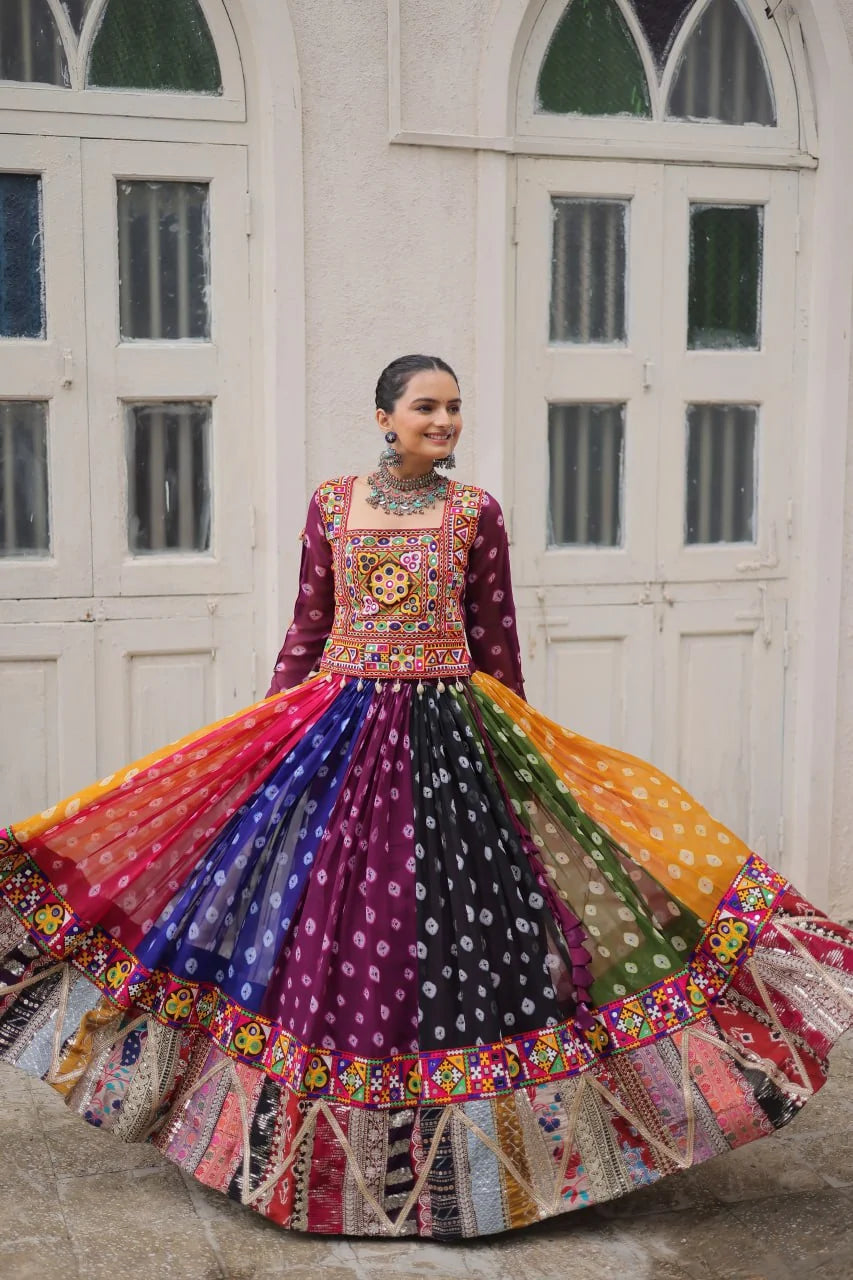 Multicolor navratri lehenga choli twirl shot showing 5-metre bandhani kali panels
