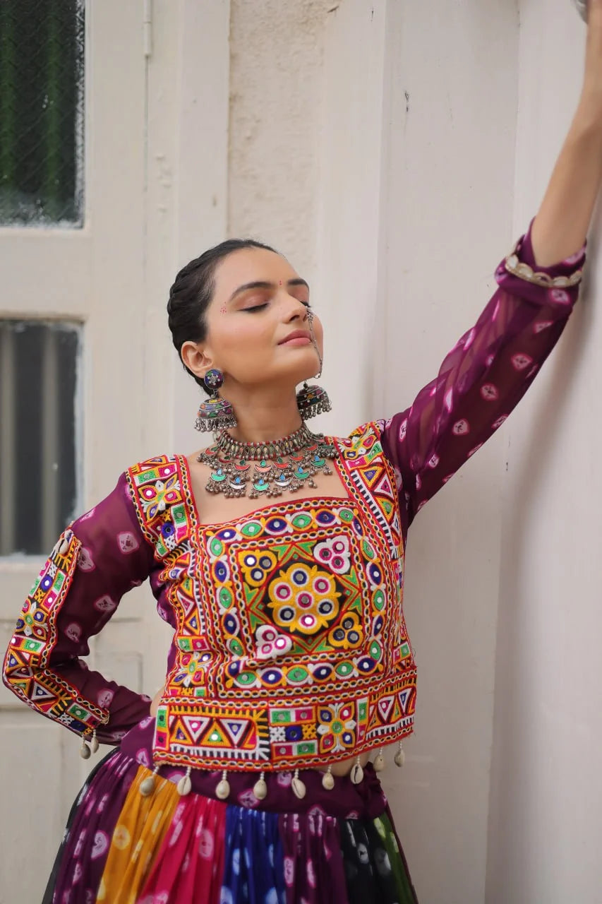 Multicolor navratri lehenga choli kutchi gamthi blouse close-up with cowrie shell detail