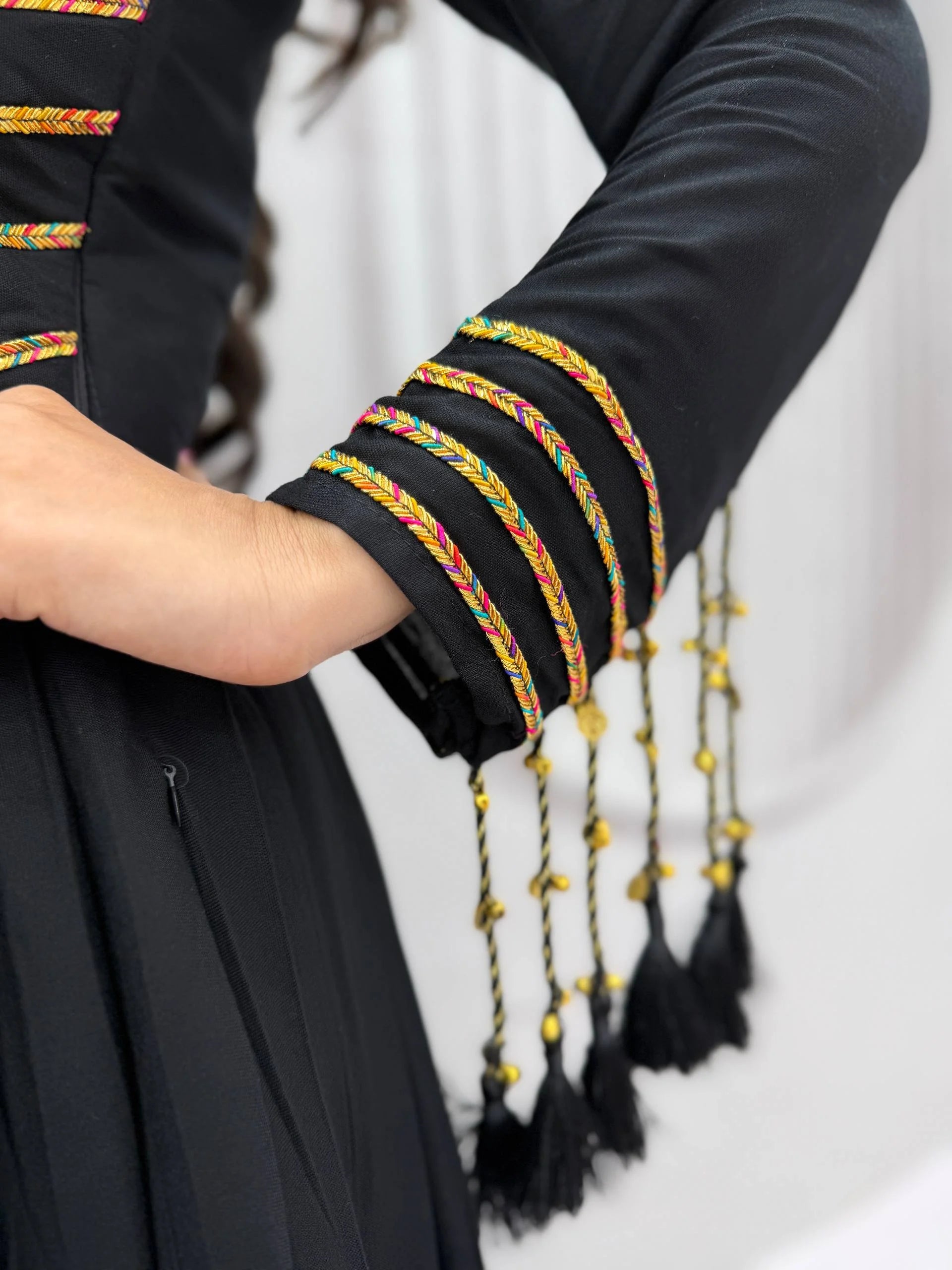 Navratri cotton gown black sleeve cuff tassel braid work detail closeup