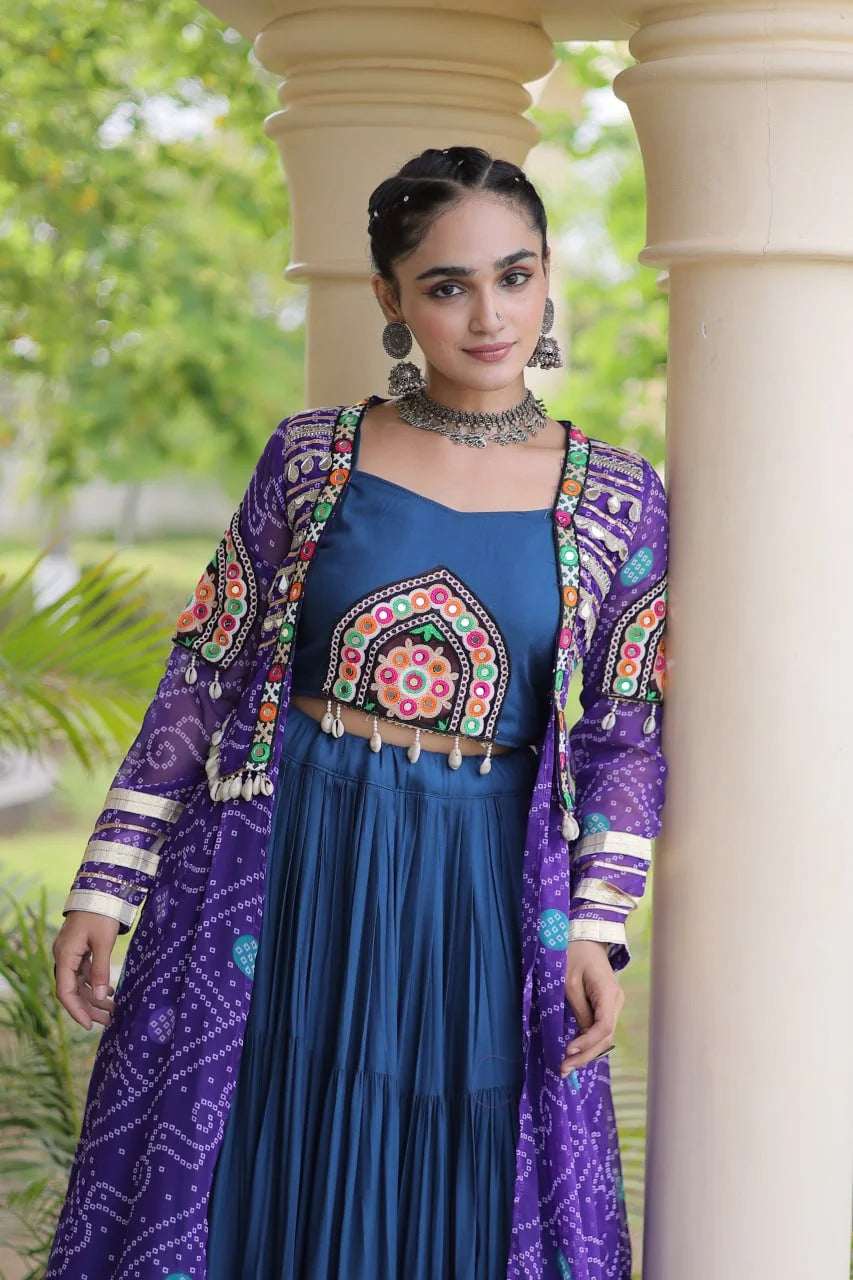 Blue kutchi patchwork lehenga close-up of crop top yoke
