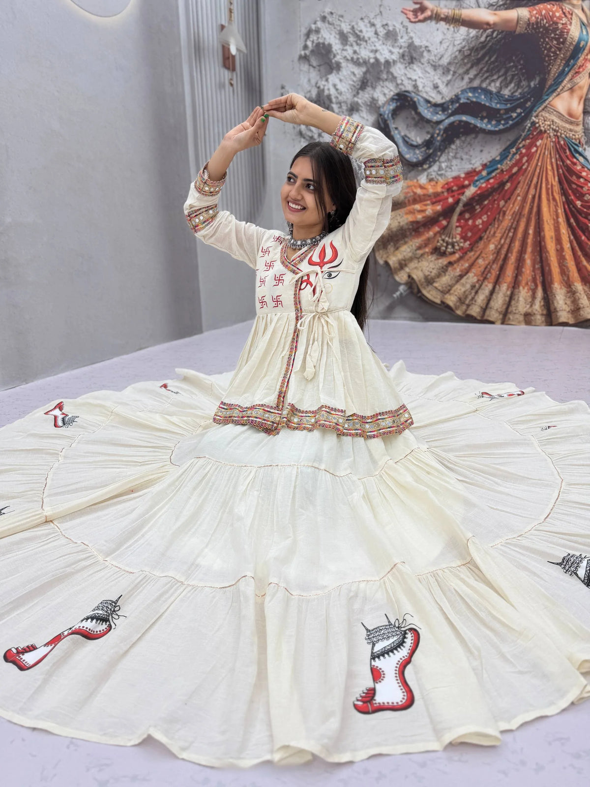 navratri kediyu lehenga choli front yoke with red swastik and trishul motifs