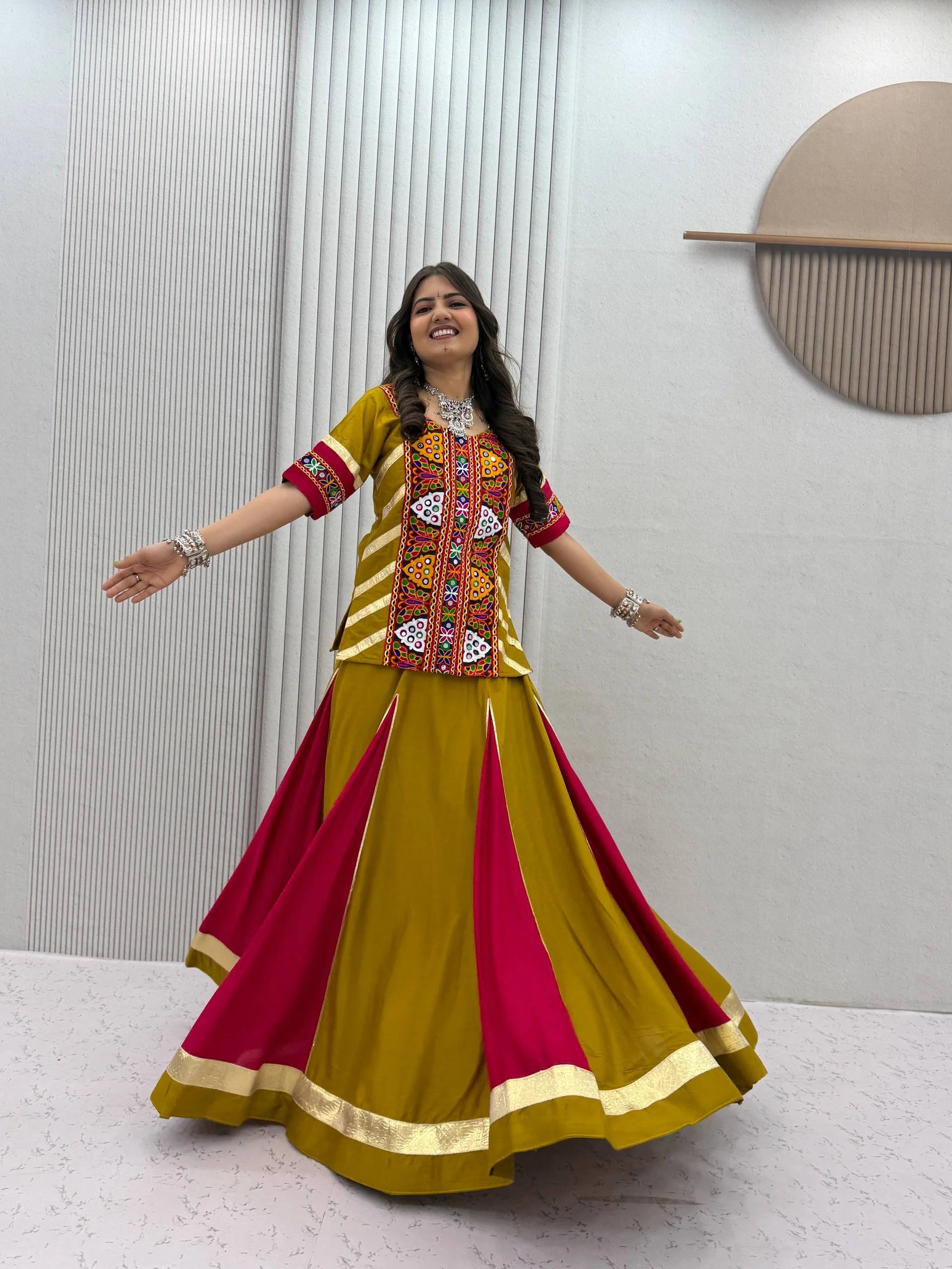 navratri kediyu lehenga mustard yellow magenta full body twirl