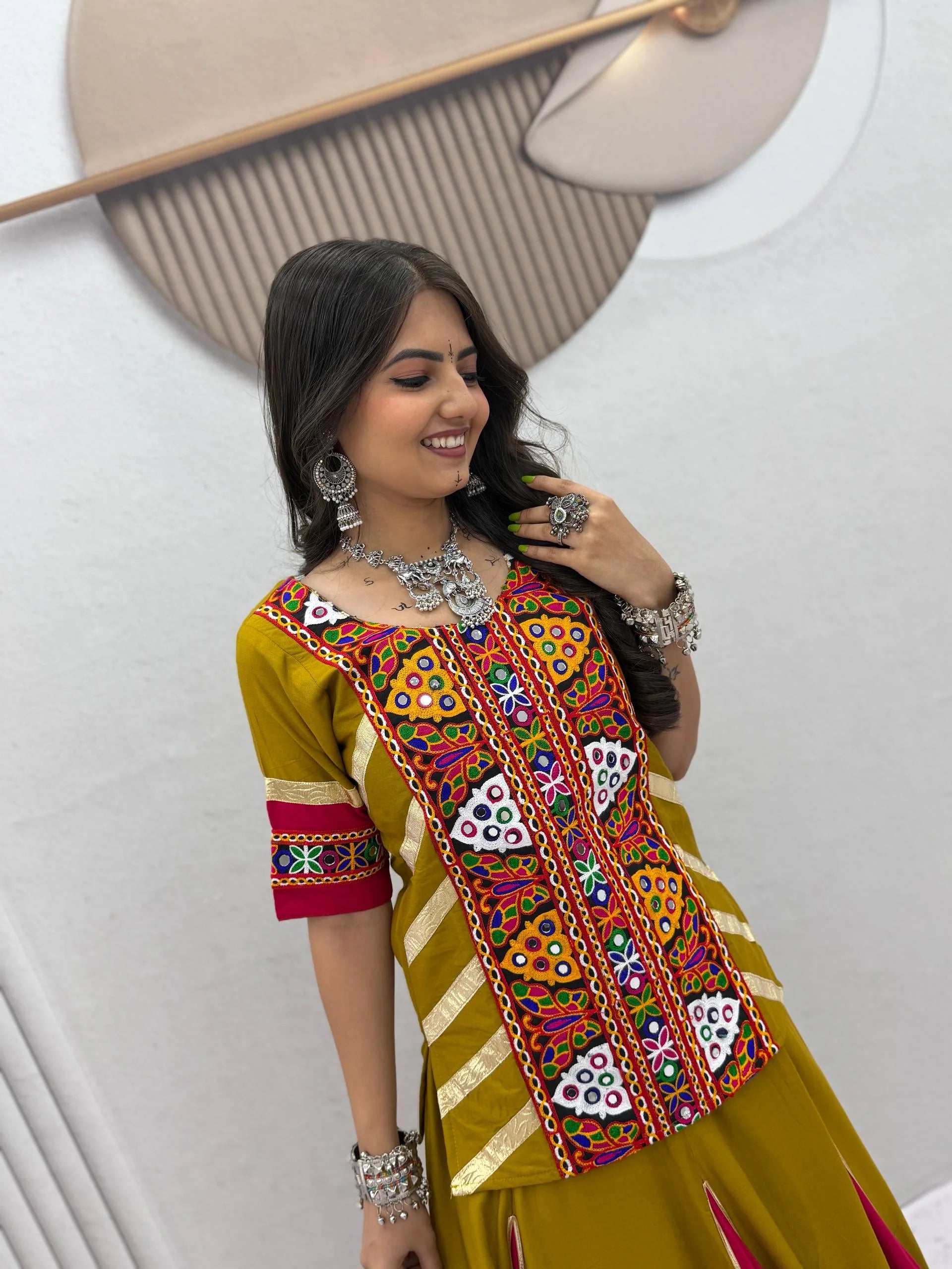 navratri kediyu lehenga mustard yellow mirror embroidery close-up