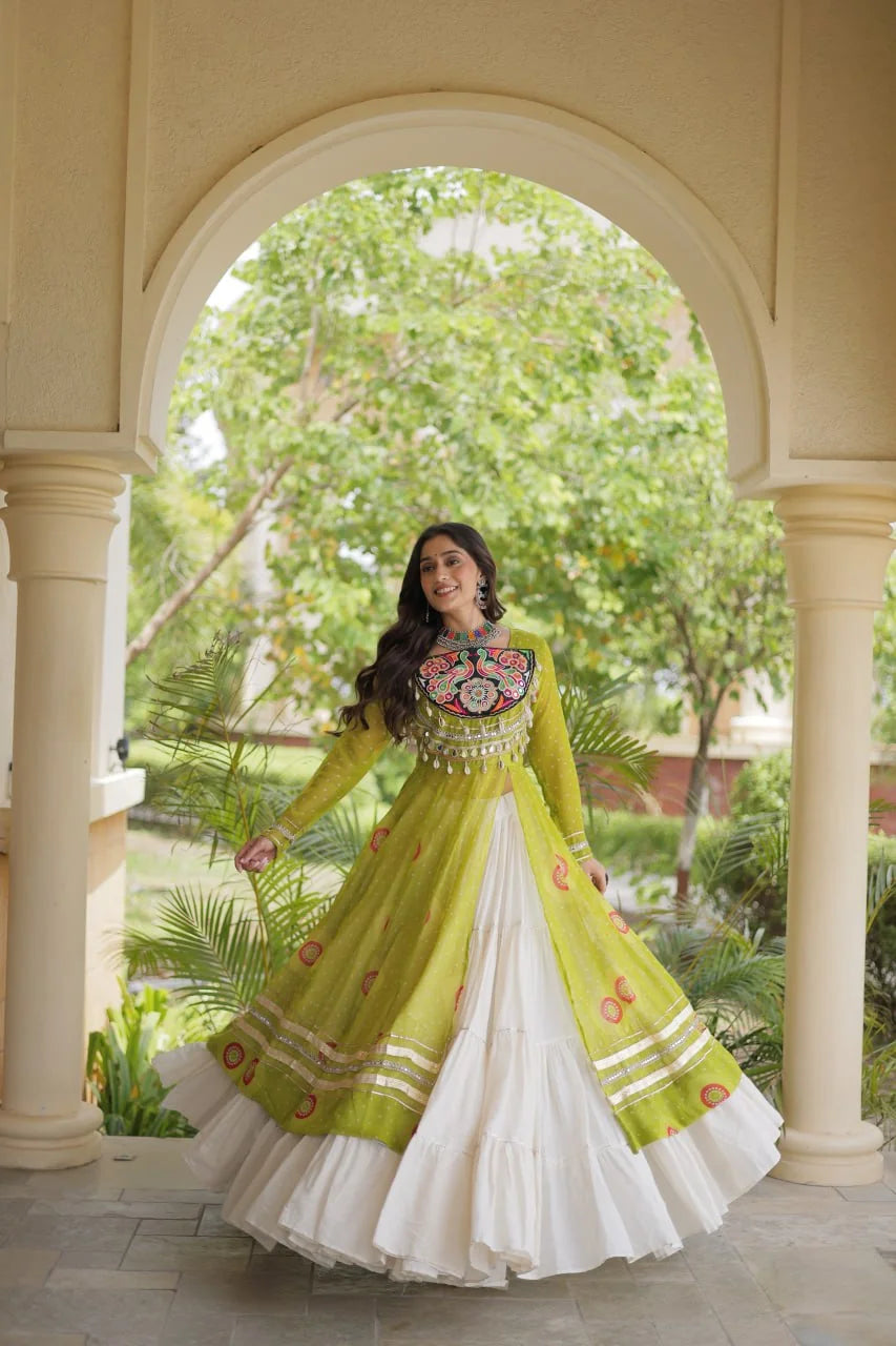 mehndi green navratri kurti lehenga with kutchi patchwork twirl pose