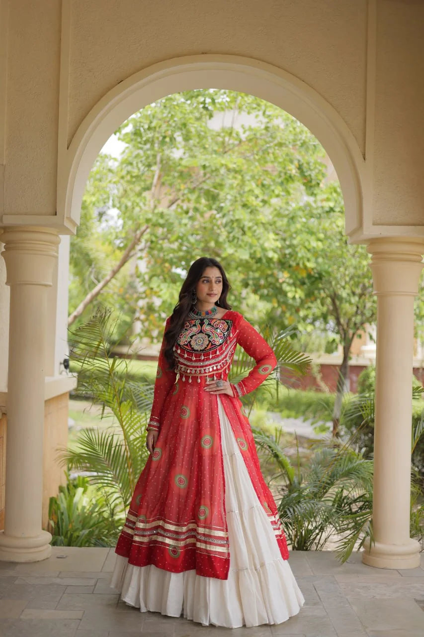 red navratri kurti lehenga with bandhani print and mirror tassel yoke