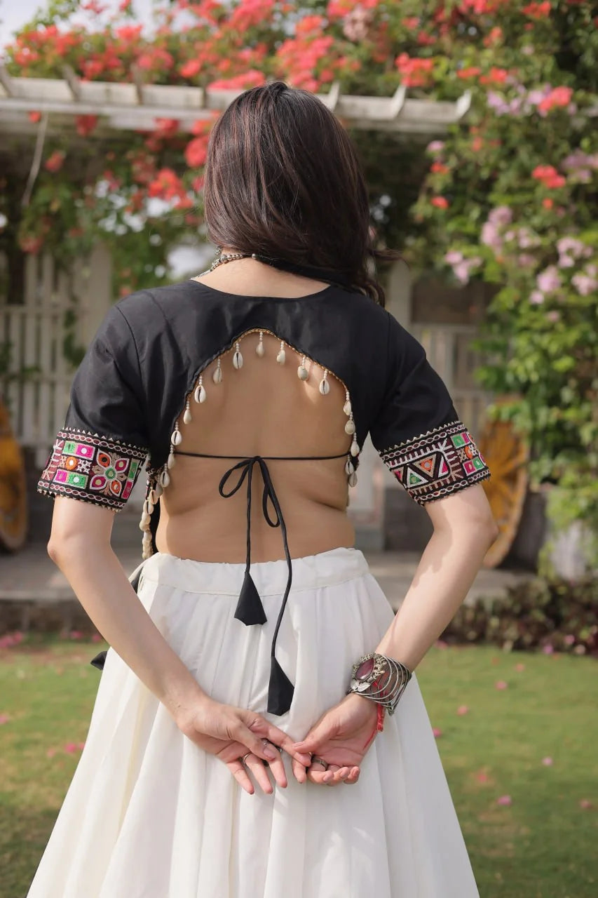 Navratri lehenga choli black Kutchi Gamthi top cowrie tassels mirror closeup