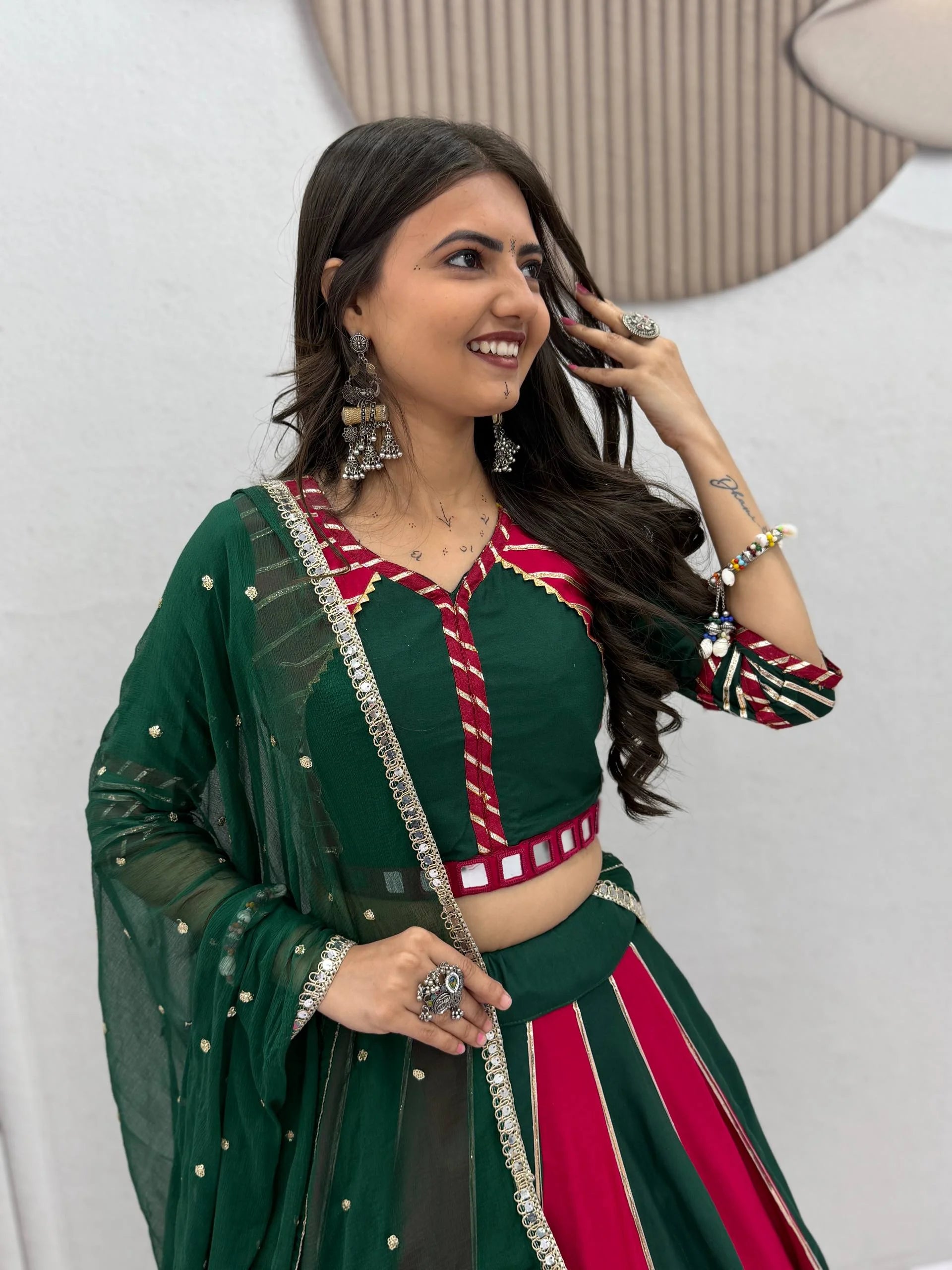 Navratri lehenga choli dupatta dark green rani pink blouse closeup cotton