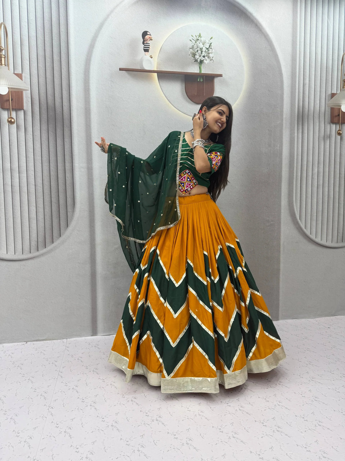 Navratri lehenga choli navy red dancing pose Garba night