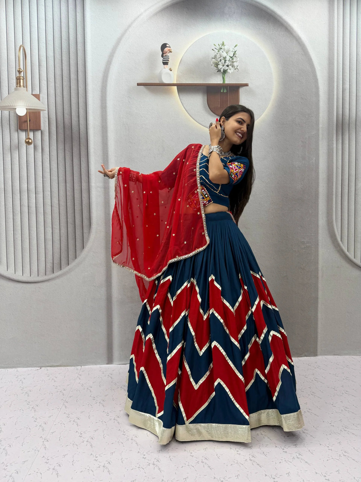 Navratri lehenga choli orange black front view with Kutchi mirror choli