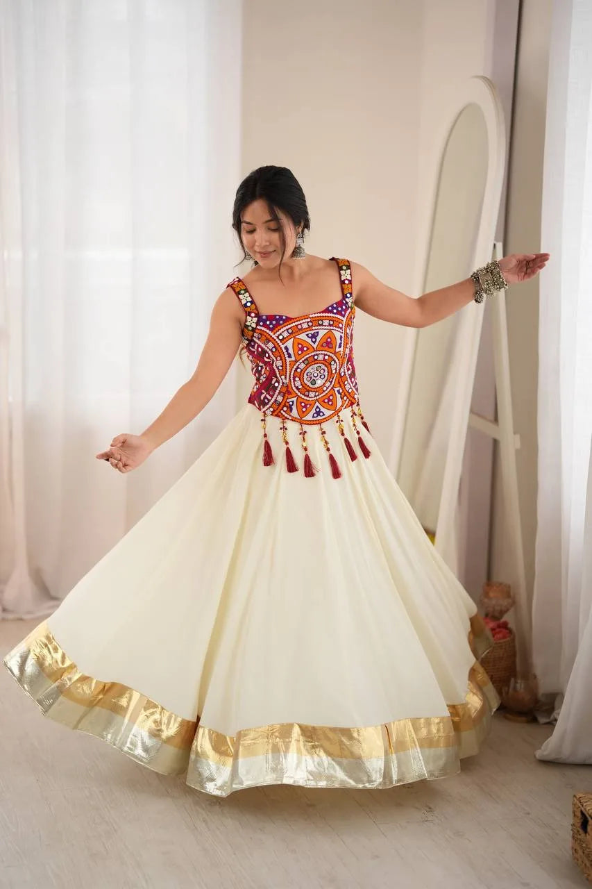 Off white navratri chaniya choli spinning to show 5-metre garba flair with gold tissue border — twirl view