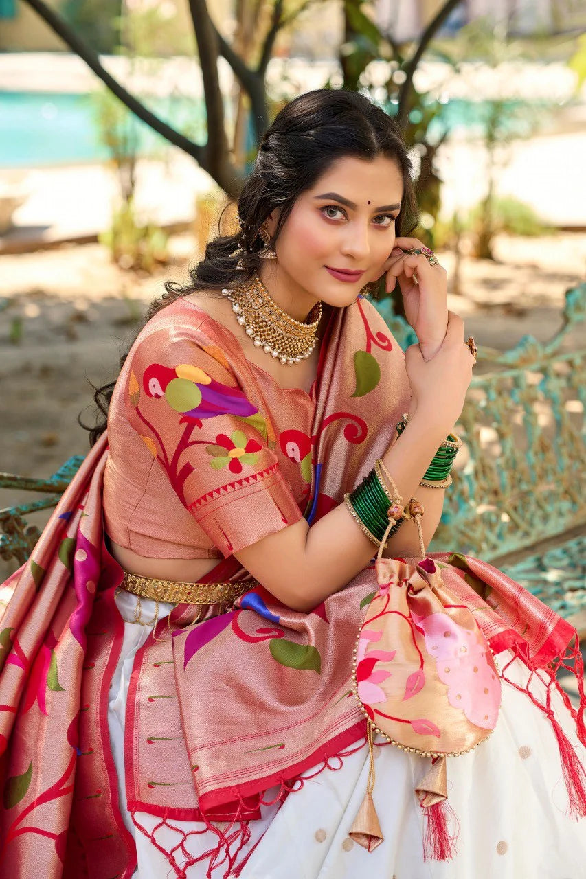 Paithani lehenga with batwa sitting pose showing jacquard dupatta with both-side tassels