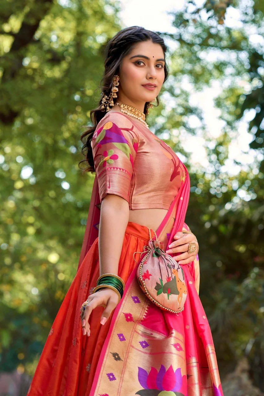 Paithani lehenga set orange and pink with batwa potli bag and paithani motifs – front view