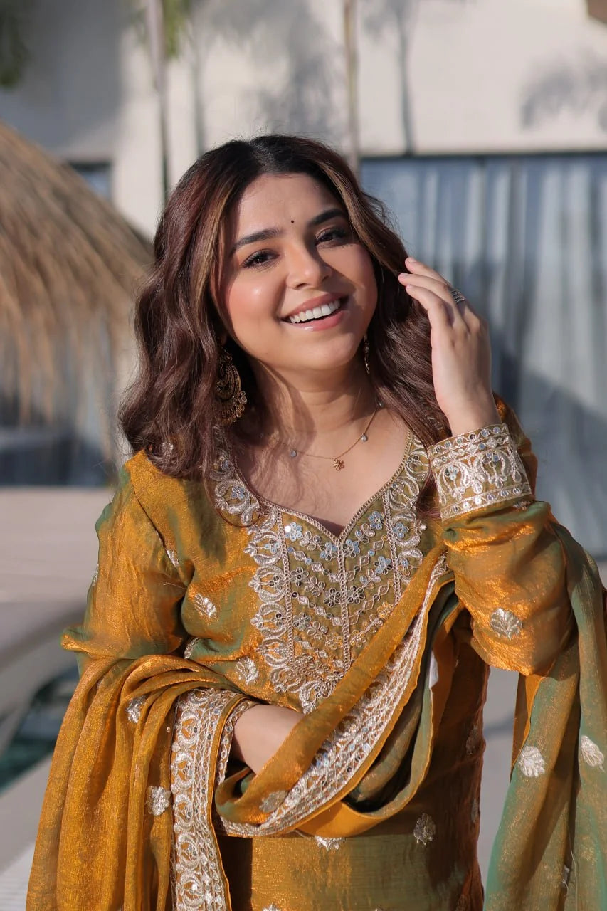 golden sharara suit portrait with lace border dupatta
