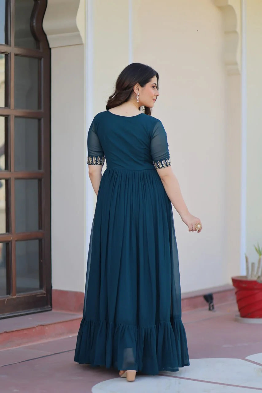 teal party wear gown back view with ruffle hem