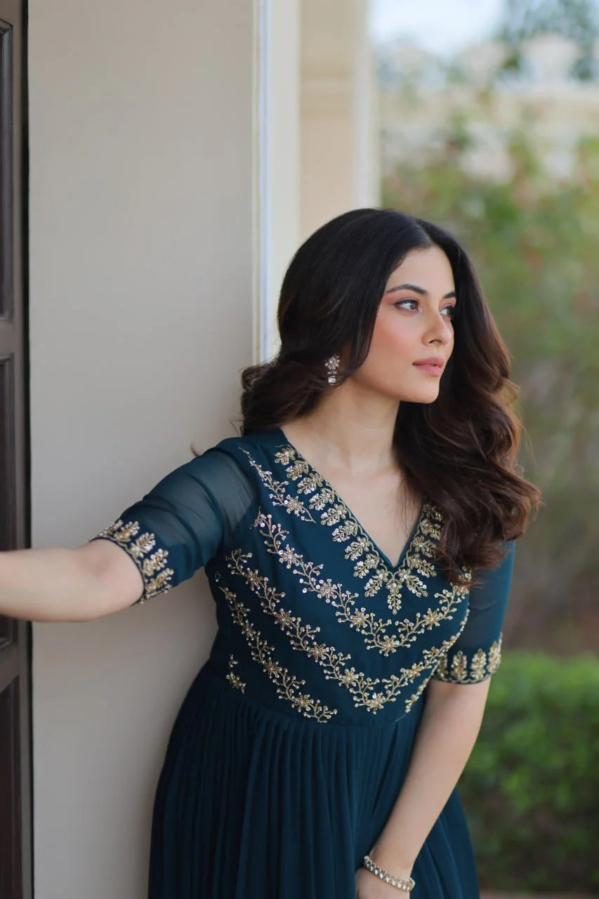 teal party wear gown detail with embroidered sleeves