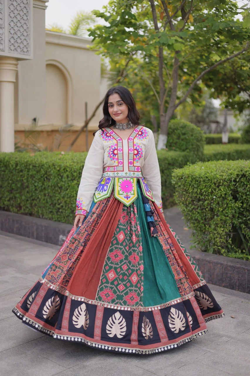 Patola chaniya choli twirl showing the four-metre patola-print cotton flair, dance view