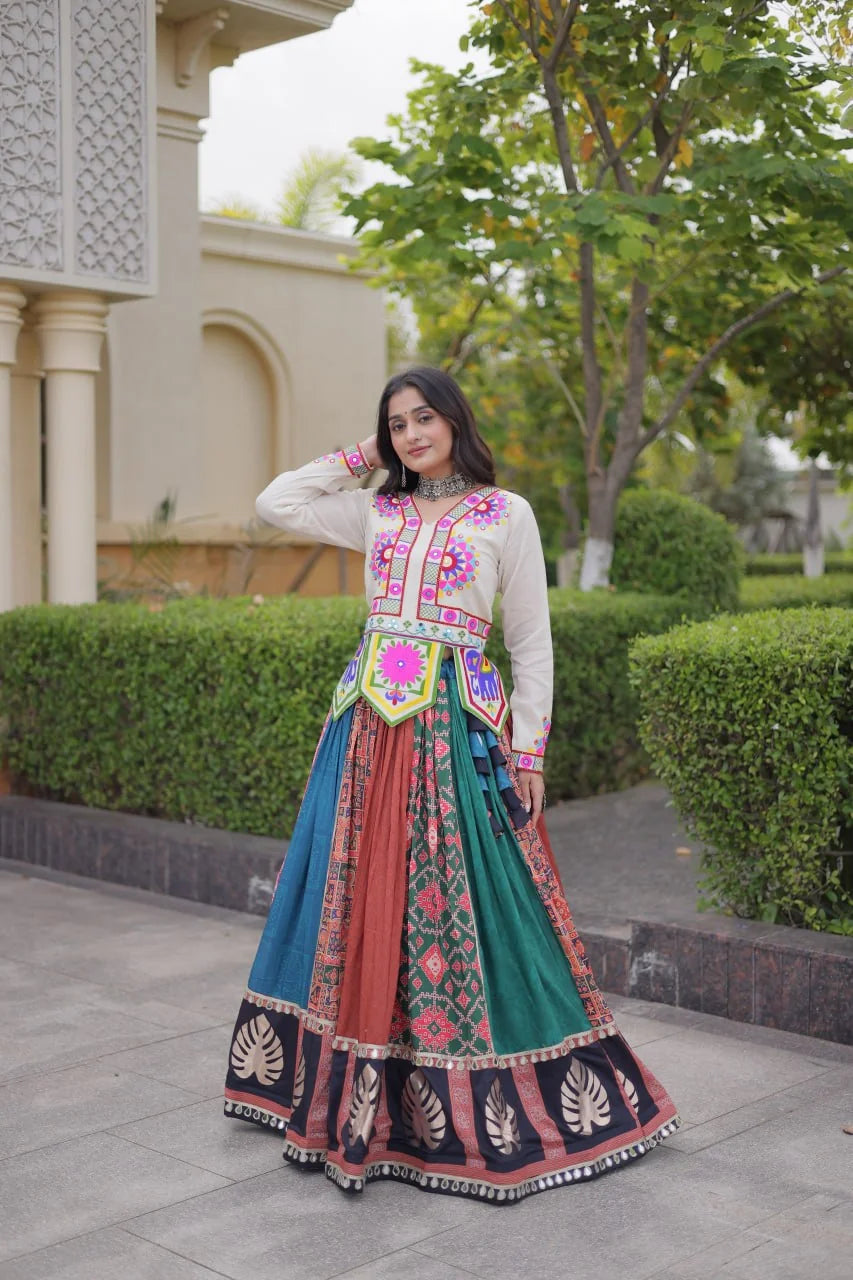 Off-white gamthi koti with mirror and elephant motif over the patola chaniya choli skirt, view
