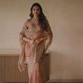 peach tibby silk saree with thread and sequin work front view