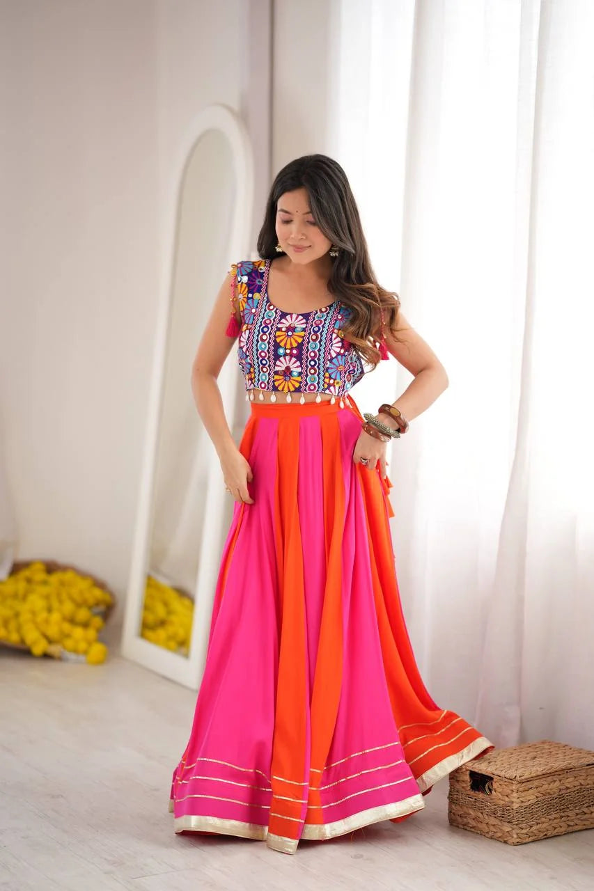 side view of pink orange navratri lehenga choli with side zipper detail