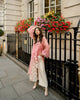 Full view of pink organza 3-piece kurta set with cream pant – front