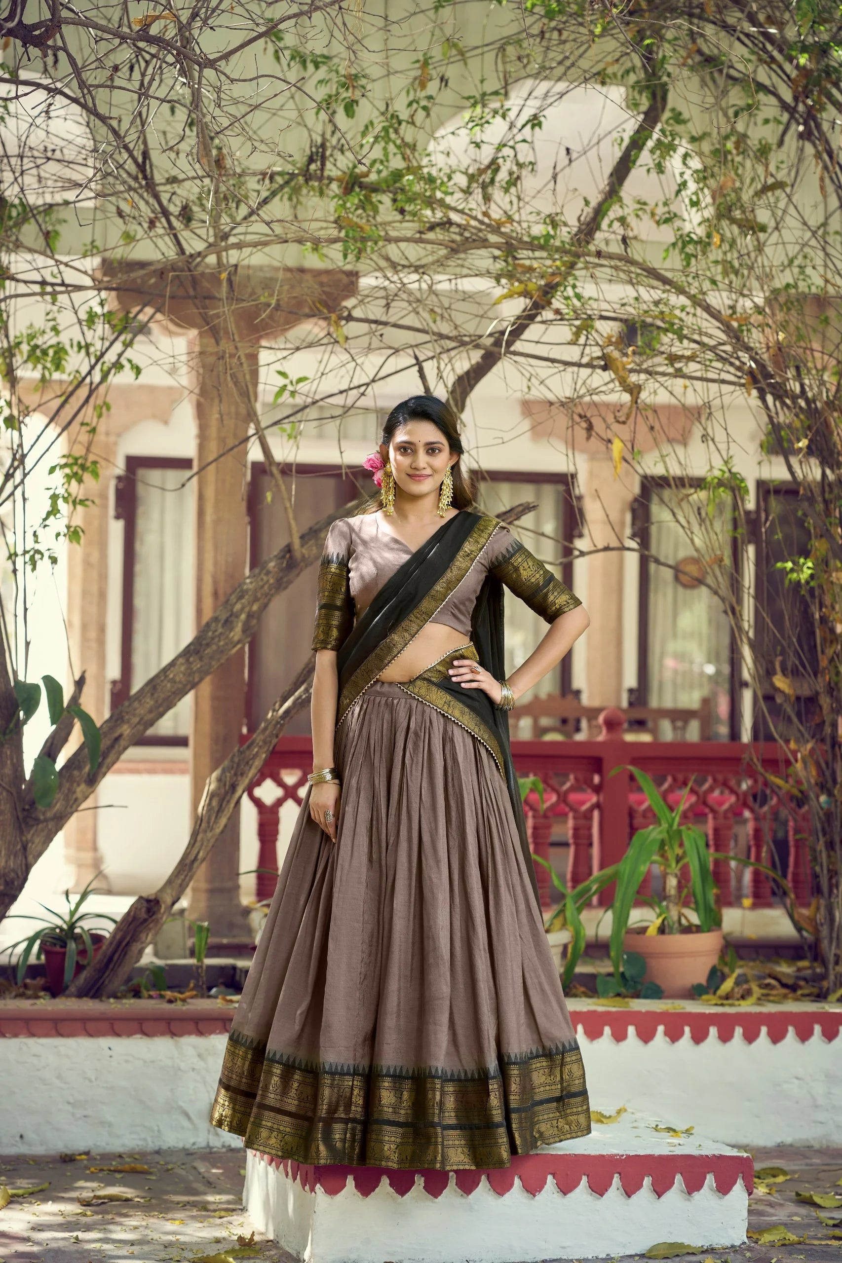 brown poly cotton lehenga choli zari border full view black dupatta outdoor