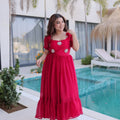 rani pink puff sleeve gown standing front view
