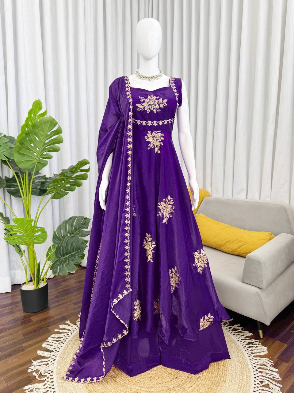 Royal purple embroidered Fendy silk Anarkali palazzo set with dupatta displayed on mannequin indoor