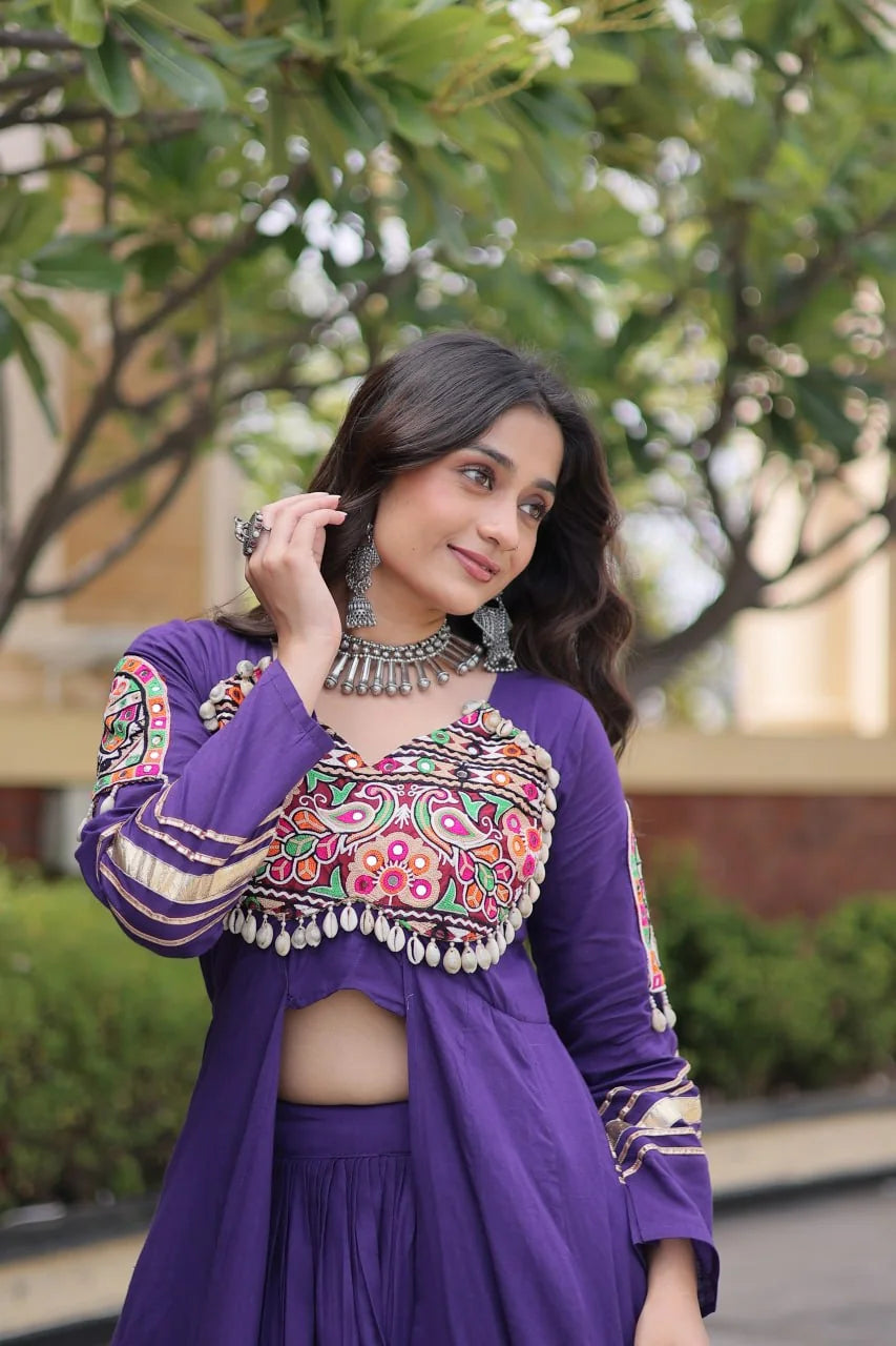 Gamthi mirror work navratri lehenga set purple closeup shrug gamthi panel cowrie shells