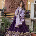 purple gown with dupatta twirl with gold zari hem